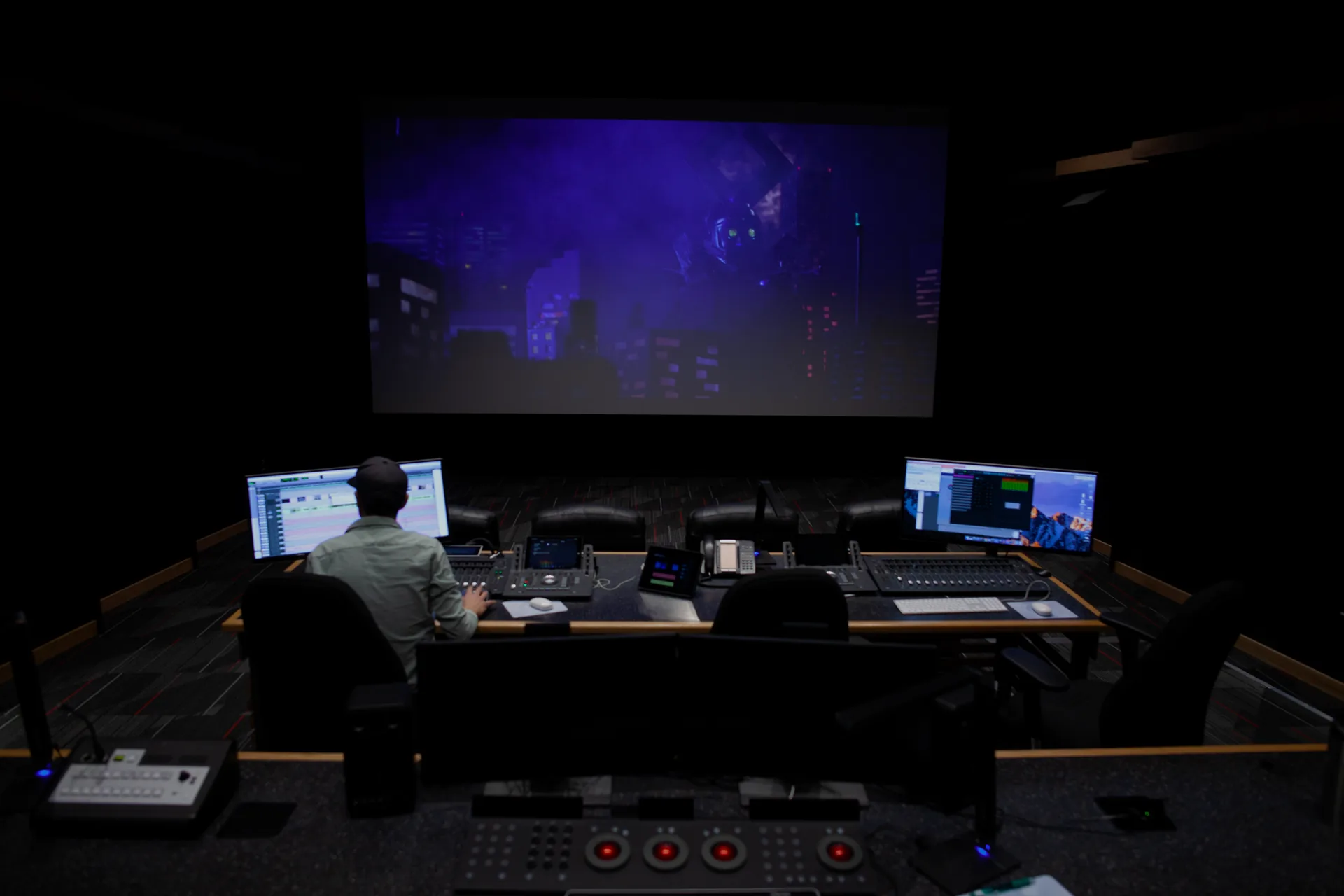 Audio post-production suite with film projection and mix consoles